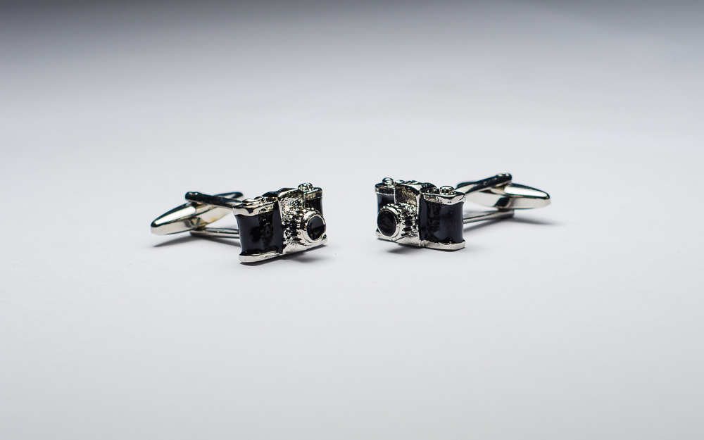 Cufflinks shaped like cameras